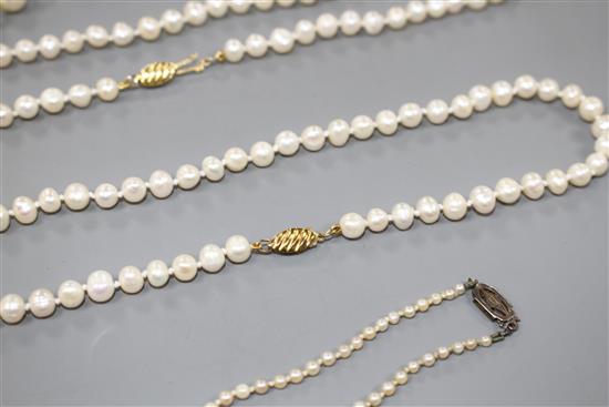 Seven assorted single strand cultured pearl necklaces, three with 925 clasps, two with 935 or 835 clasps and two others